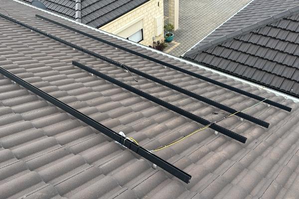 Rail on tile double story roof